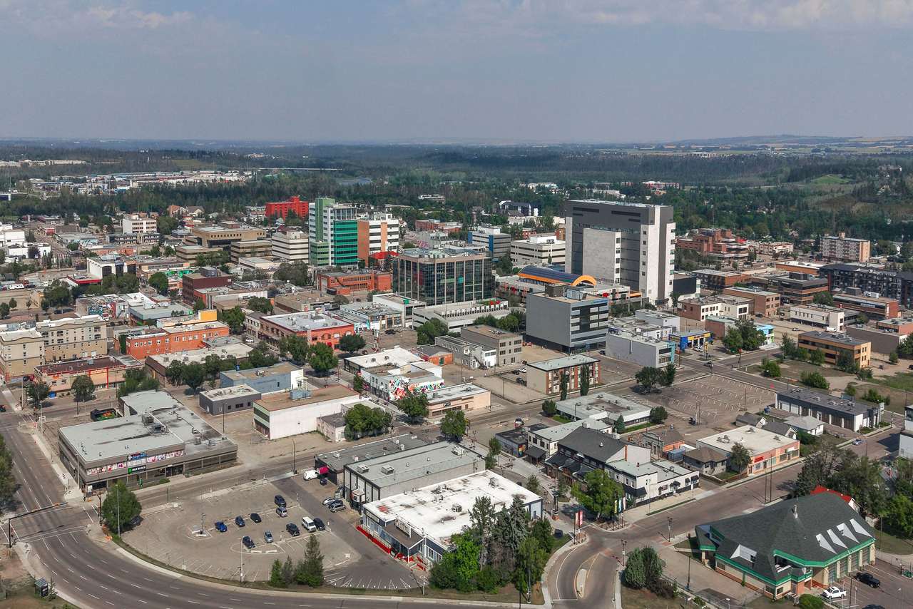 Aerial view of downtown Red Deer, Alberta, with the Red Deer River valley beyond